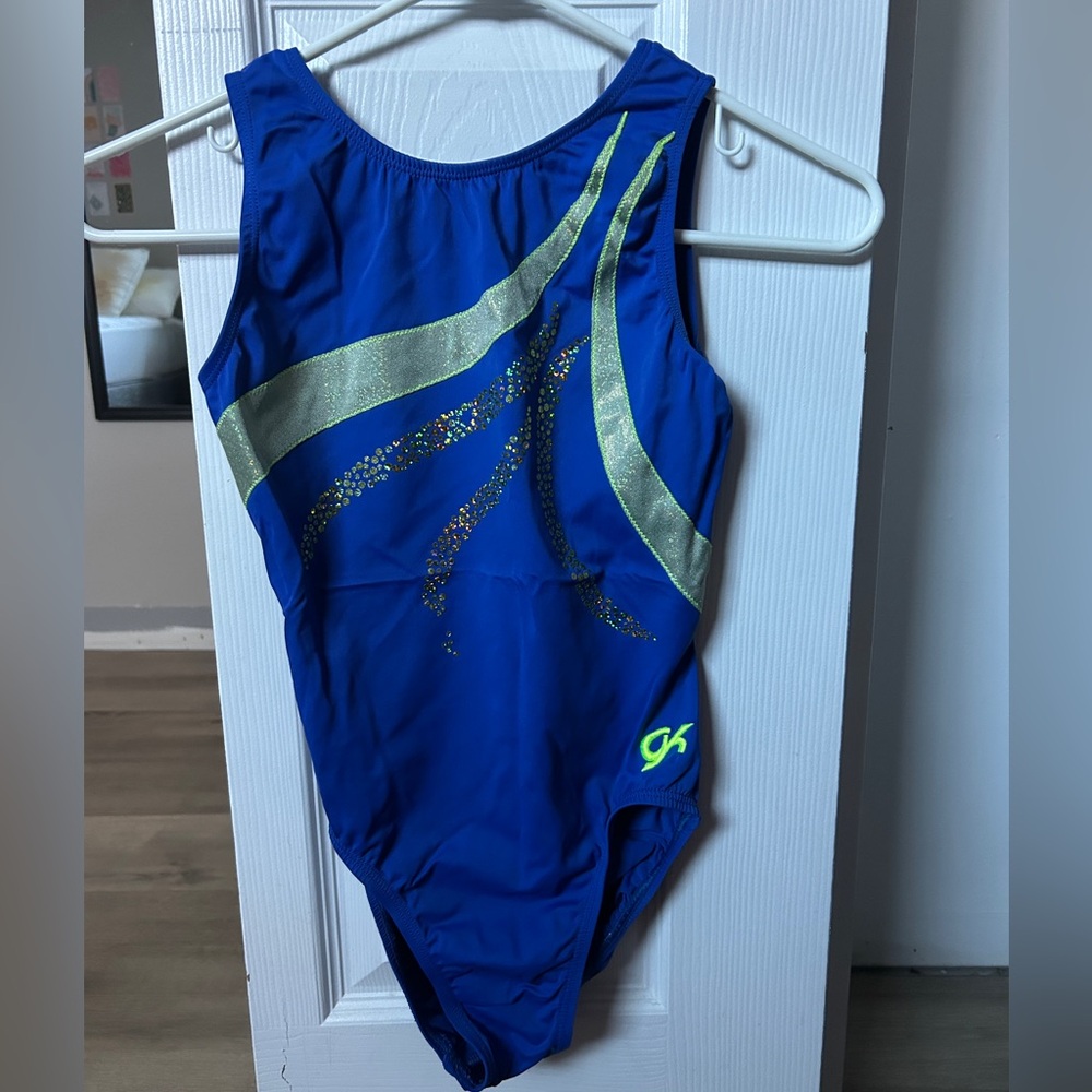 Blue GK gymnastics leotard.